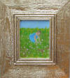 women bending in flower field